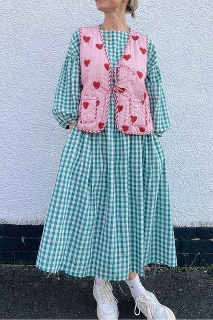 Love reversible quilted sleevless jacket